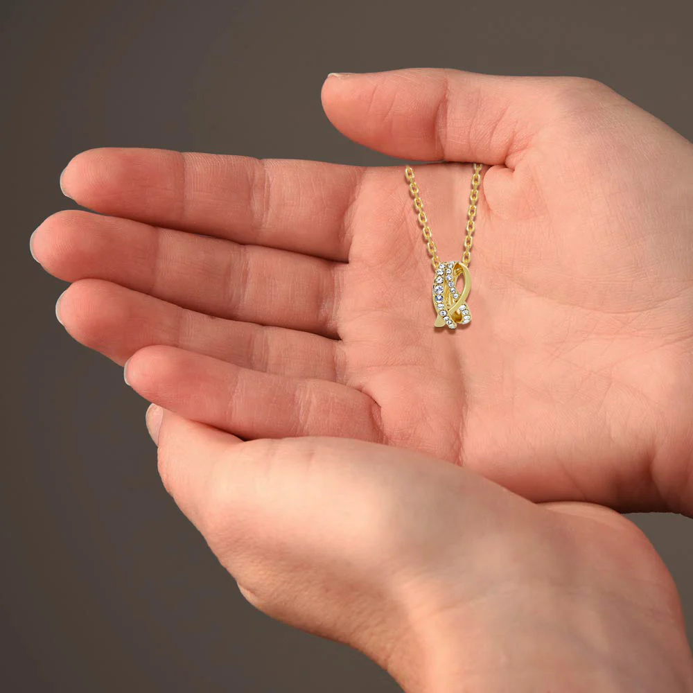 TRYNDI 18K Gold Plated "Eternal Knot" Swarovski Crystal Accented Necklace - Image 7